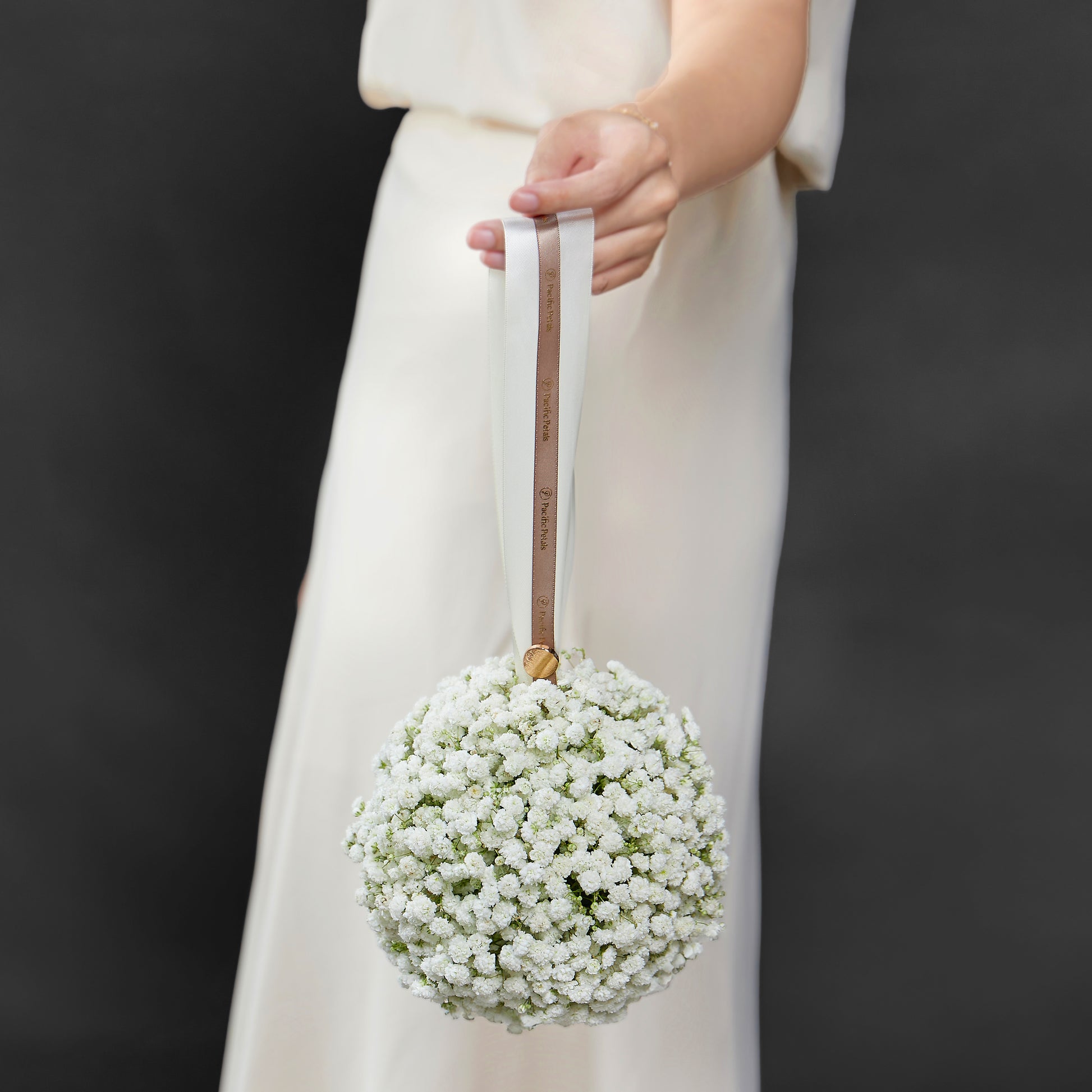 white baby's breath pomander bouquet