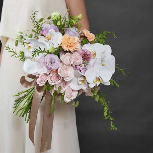 Soft pink and purple bridal bouquet