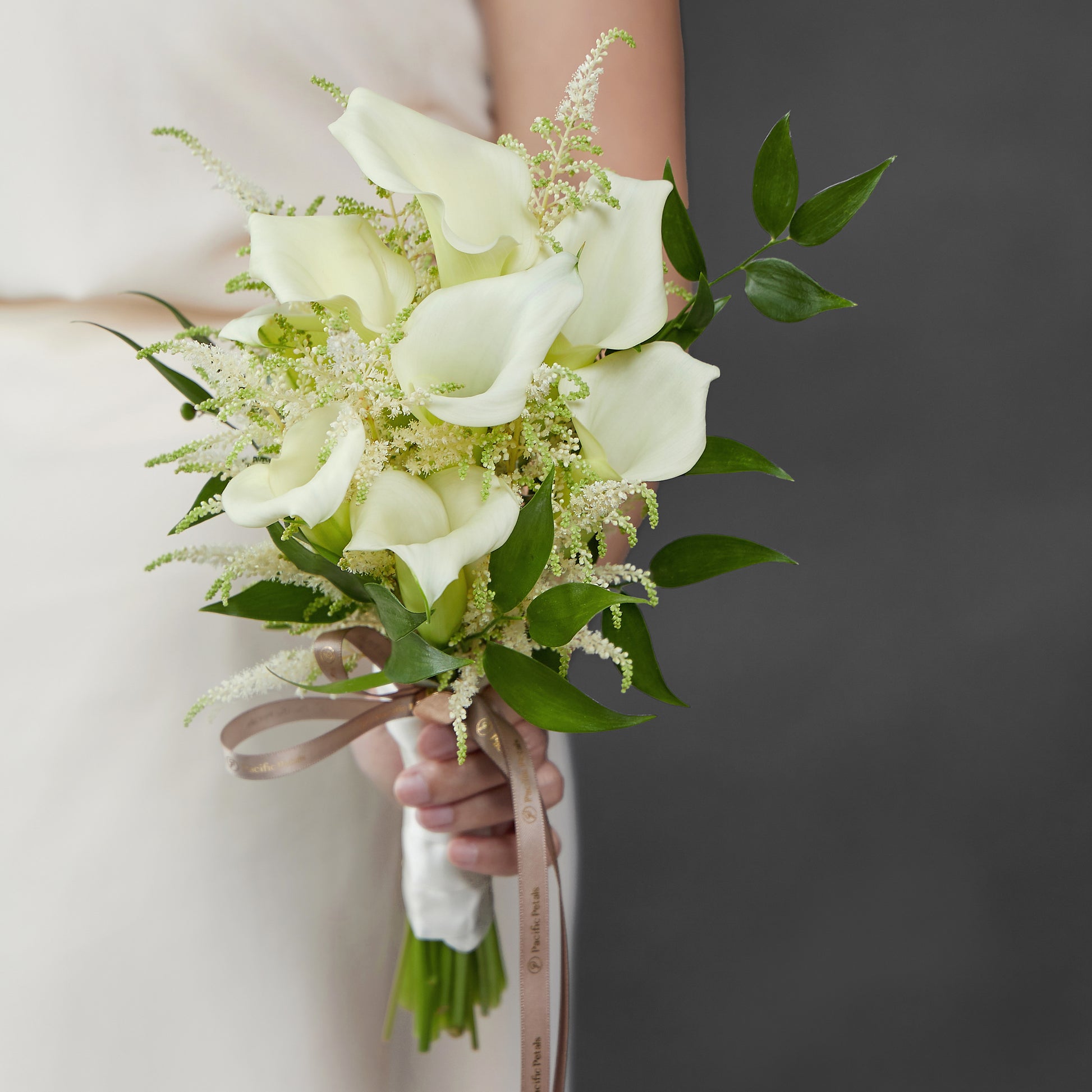 white calla lily and astilbe bridal bouquet