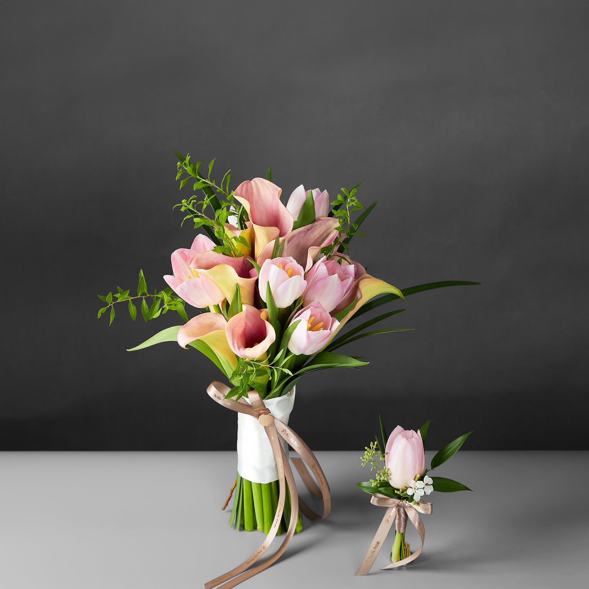 pink calla lily and tulip bridal bouquet with groom boutonniere