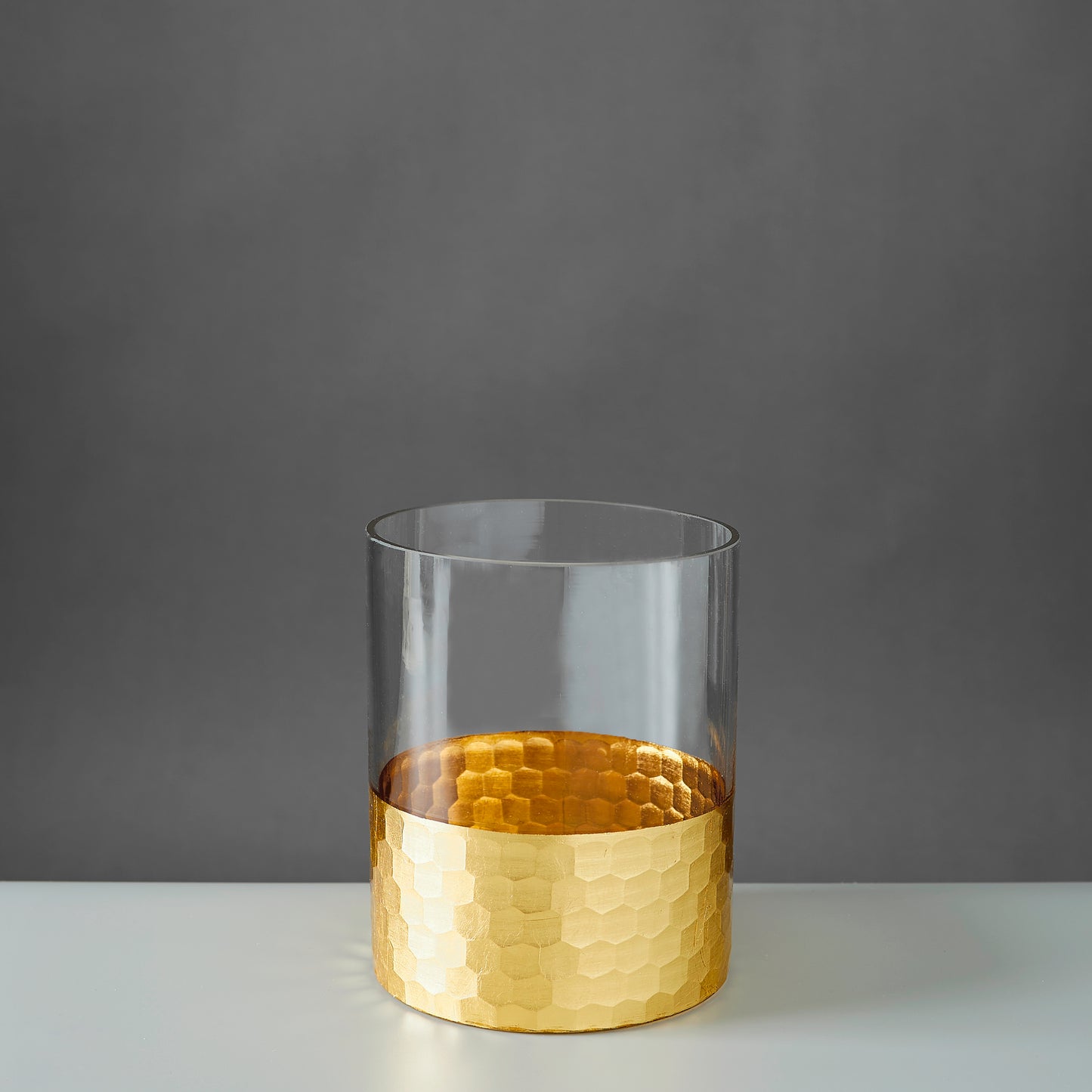 Glass vase with gold trim